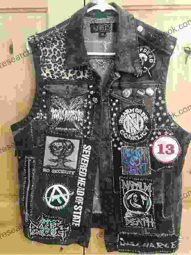A Black Punk Rock Vest With A Variety Of Punk Rock Motifs, Such As Safety Pins, Studs, And Patches. Pretty In Punk: 25 Punk Rock And Goth Knitting Projects
