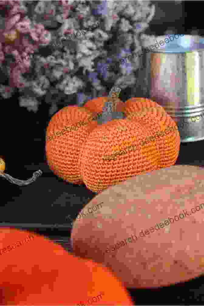 A Crocheted Amigurumi Pumpkin With Button Eyes And A Green Stem Adorable Halloween Crochet Tutorials: Cute Halloween Patterns And Instructions