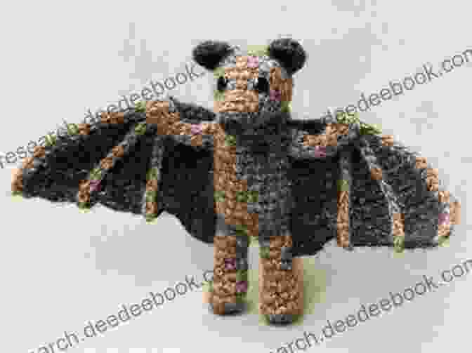A Crocheted Bat With Black Yarn And Lacework Wings Adorable Halloween Crochet Tutorials: Cute Halloween Patterns And Instructions