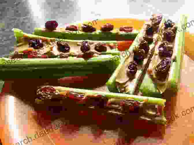 Ants On A Log Made With Celery Sticks, Peanut Butter, And Raisins Cooking Is Cool: Heat Free Recipes For Kids To Cook